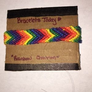 A rainbow colored, chevron style bracelet.